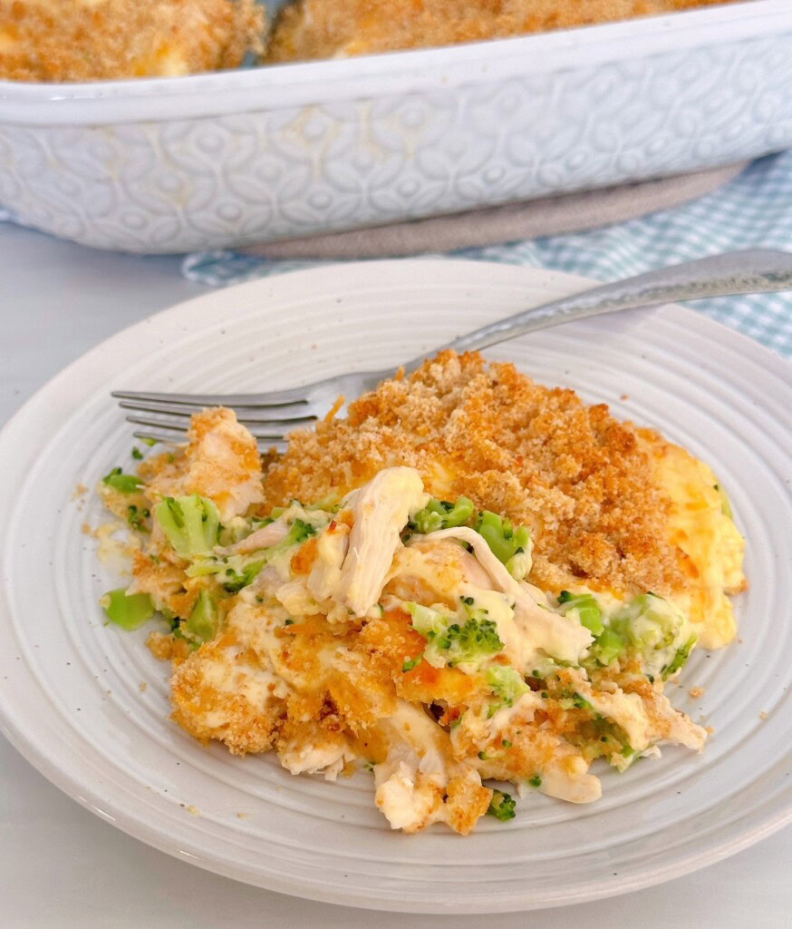 Chicken Broccoli Casserole serving for dinner on a plate with a fork.