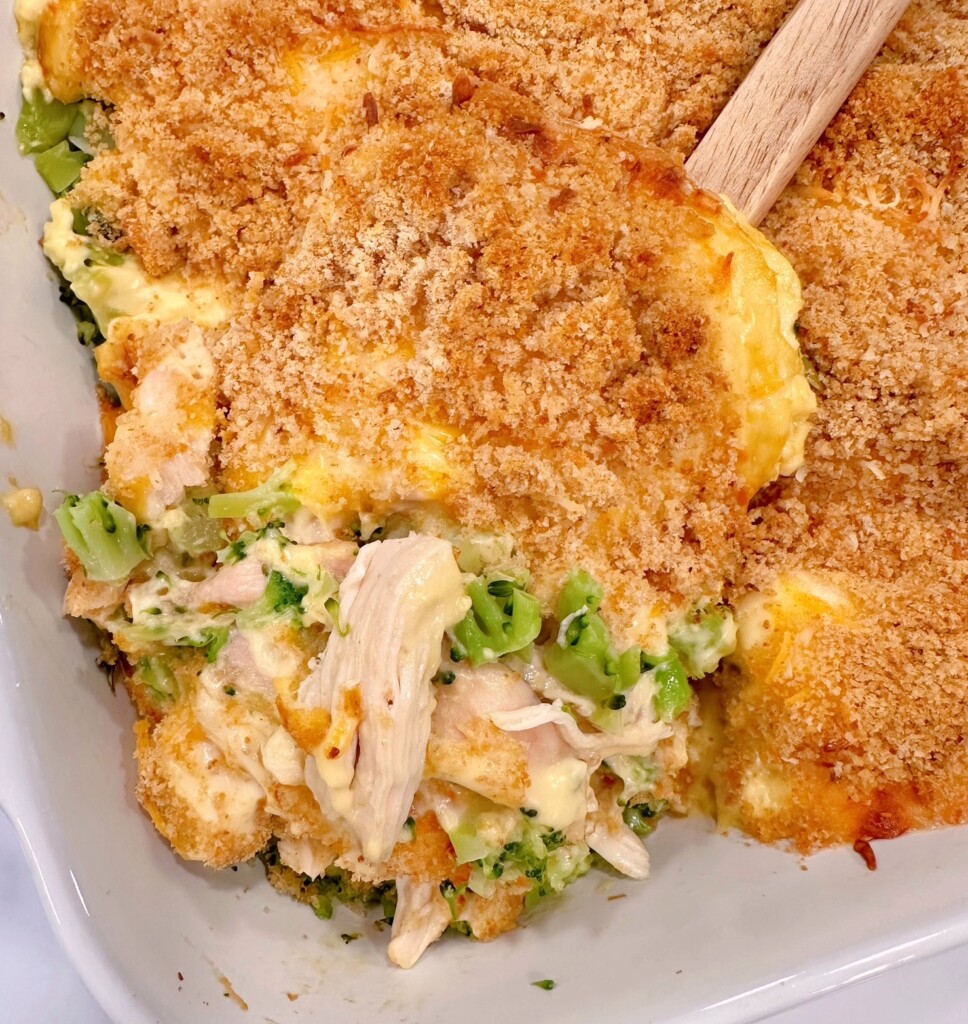 Serving up a scoop of chicken broccoli casserole.
