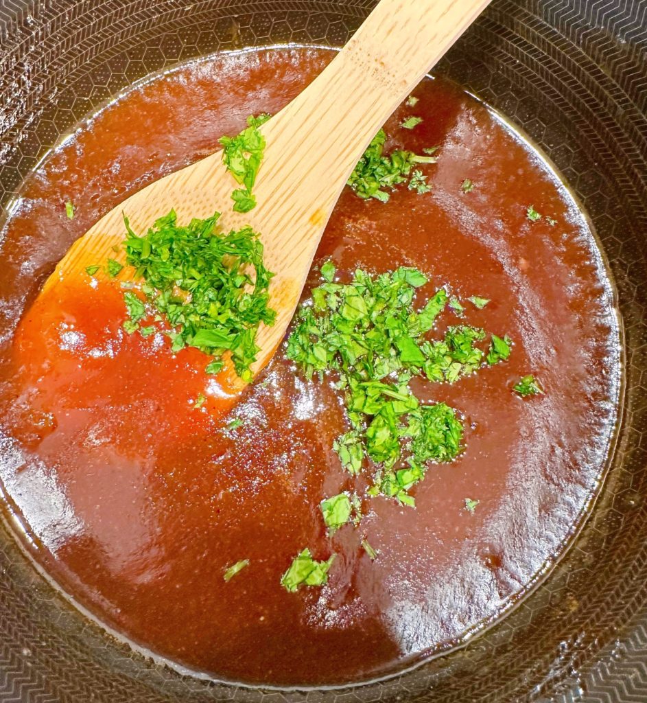 Add chopped cilantro to the apricot glaze.