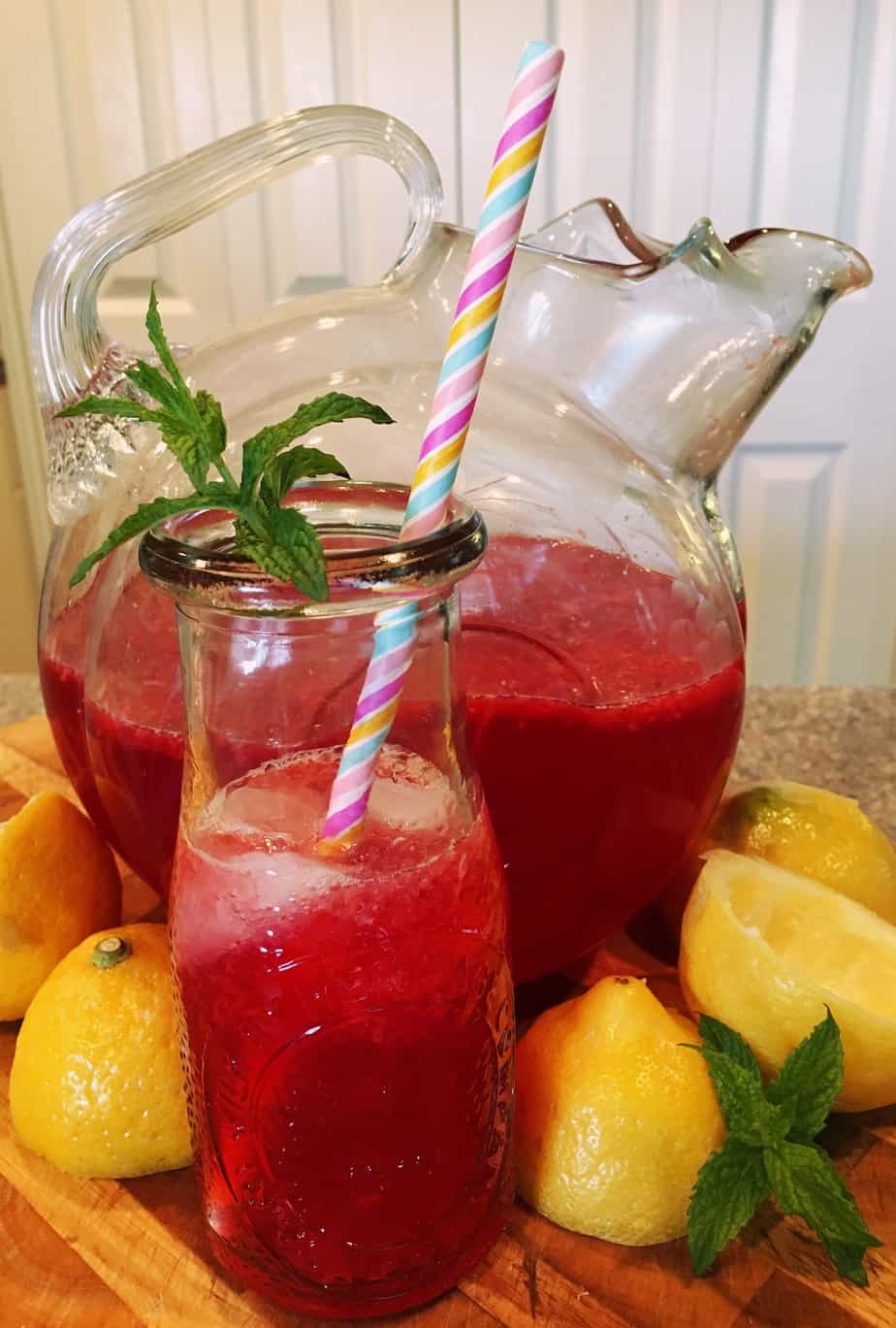 berry lemonade in a pitcher