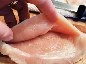 Chicken Cordon Bleu cutting slit to create pouch for ham and cheese.