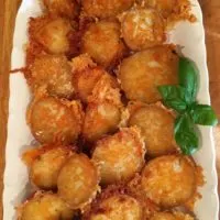 Crispy Garlic Parmesan Potatoes on a platter