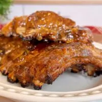 Full rack of baby back ribs slathered in special orange and apricot glaze.