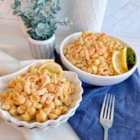 Shrimp Pasta Salad in clamshell serving bowls.