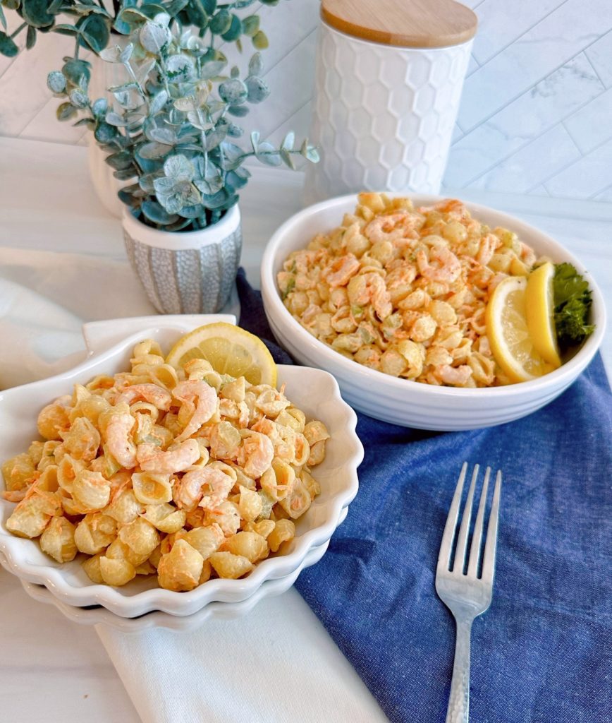 Shrimp Pasta Salad in clamshell serving bowls.