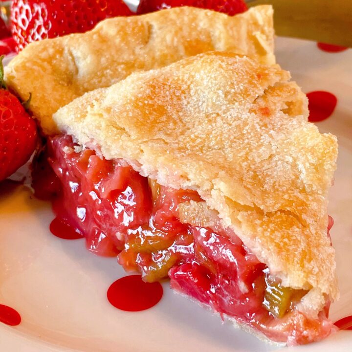 Close up photo of a slice of Strawberry Rhubarb Pie