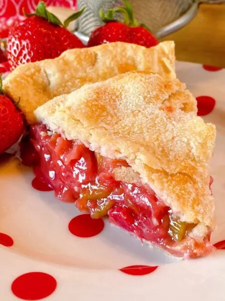 Close up photo of a slice of Strawberry Rhubarb Pie