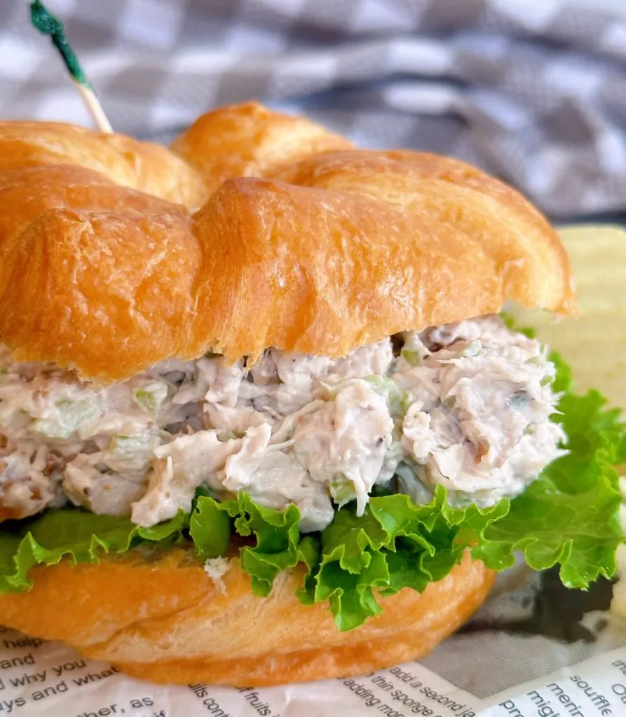 Close-up photo of Chicken Salad in a sandwich.