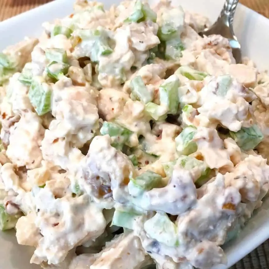 Bowl full of prepared chicken salad.