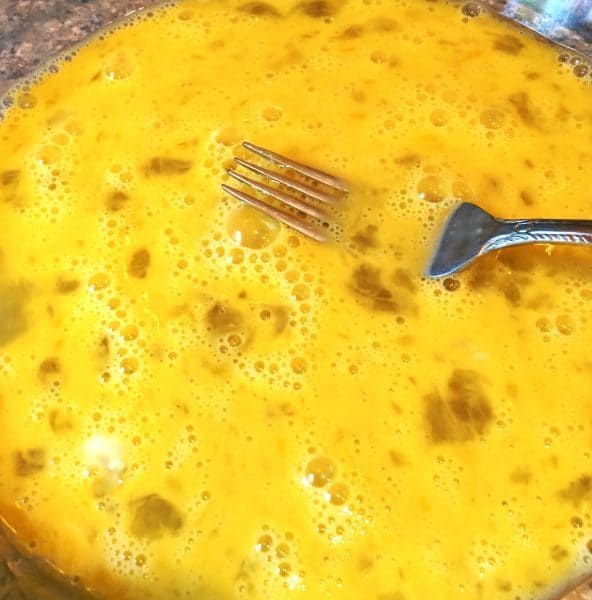 Eggs beaten with fork for egg wash