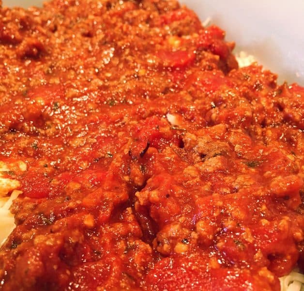 Adding a layer of meat sauce for eggplant parmigiana