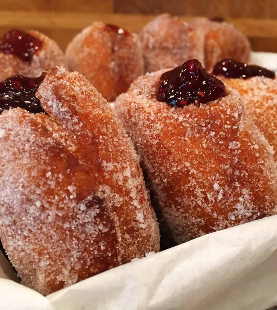 Donuts with a berry filling on a plate