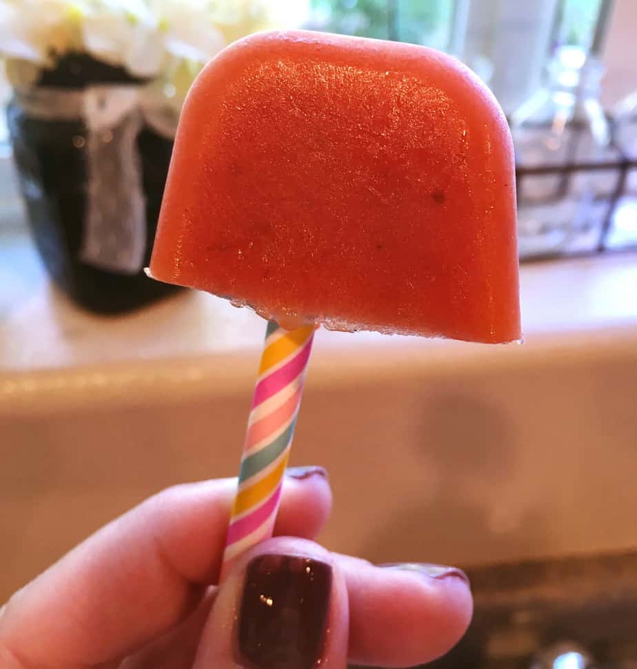 A popsicle made with fruit on a stick