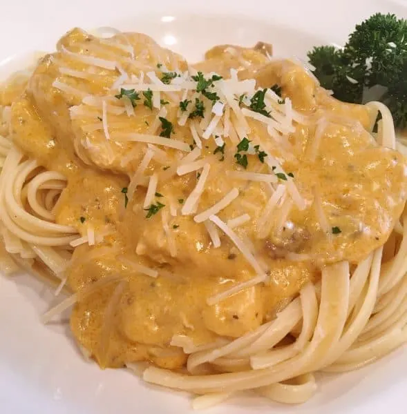 Slow cooker Angel Pasta made in the slow cooker served on a dinner plate