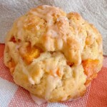 Peach Scone with a peach drizzle on top.