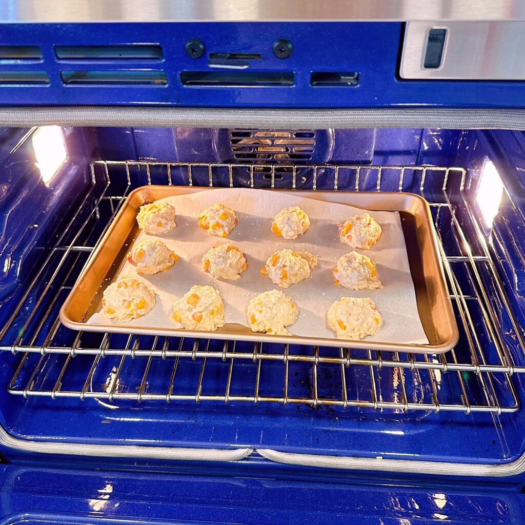 Scones placed in preheated oven.