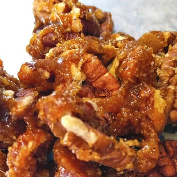 Pecan nuts in caramelized sugar for salad