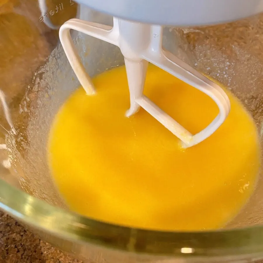 wet ingredients in mixing bowl of mixer