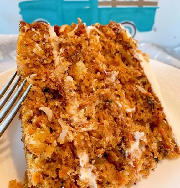 Slice of carrot cake on plate