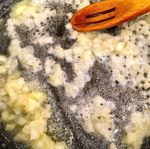 mac n cheese sauteeing the onions