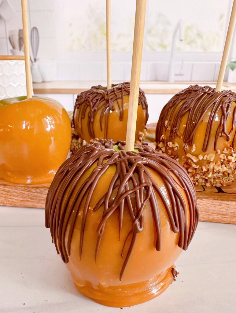 Caramel apple with drizzled chocolate.
