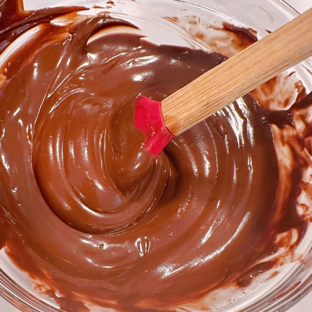 Melted chocolate chips in a bowl.