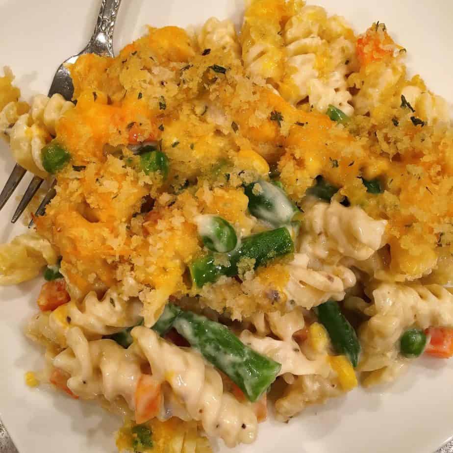 Chicken Noodle Casserole serving on a plate with a fork.