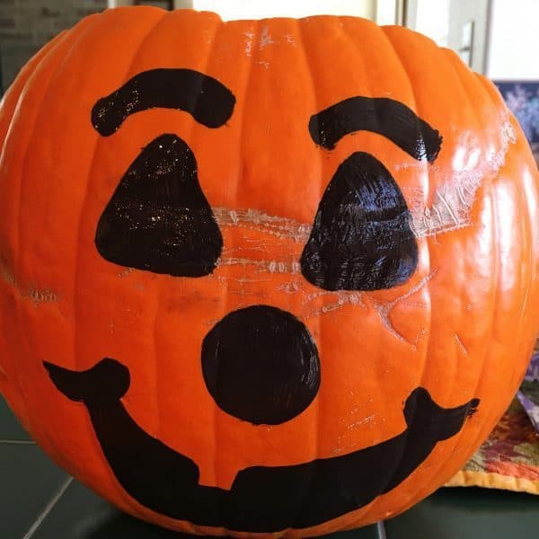 Face painted on pumpkin for dinner in a pumpkin