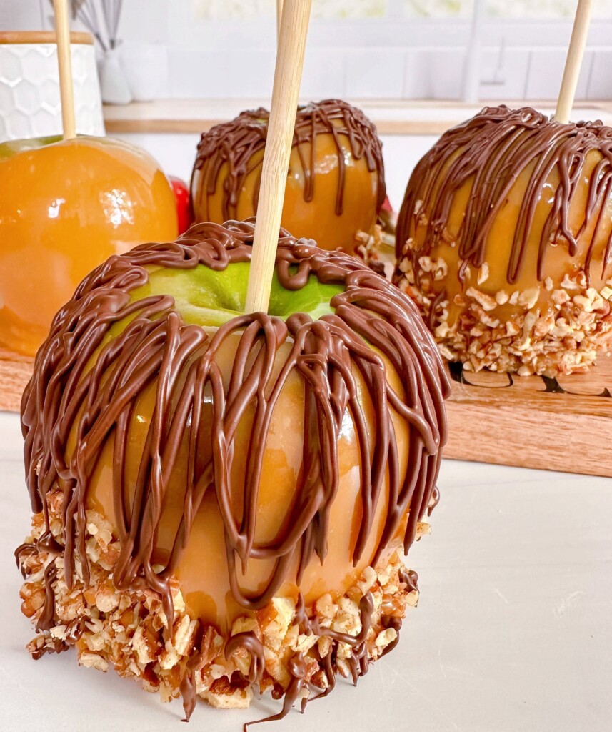 Double Caramel Apple with other apples in the background.
