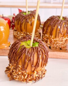 Double Caramel Apples with chocolate drizzle and pecans.