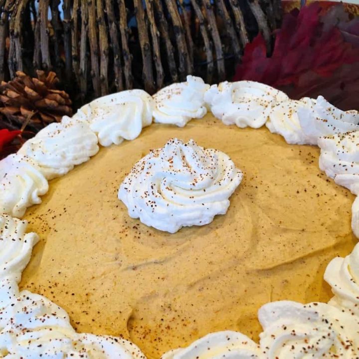 A chiffon pie made with pumpkin and whip cream