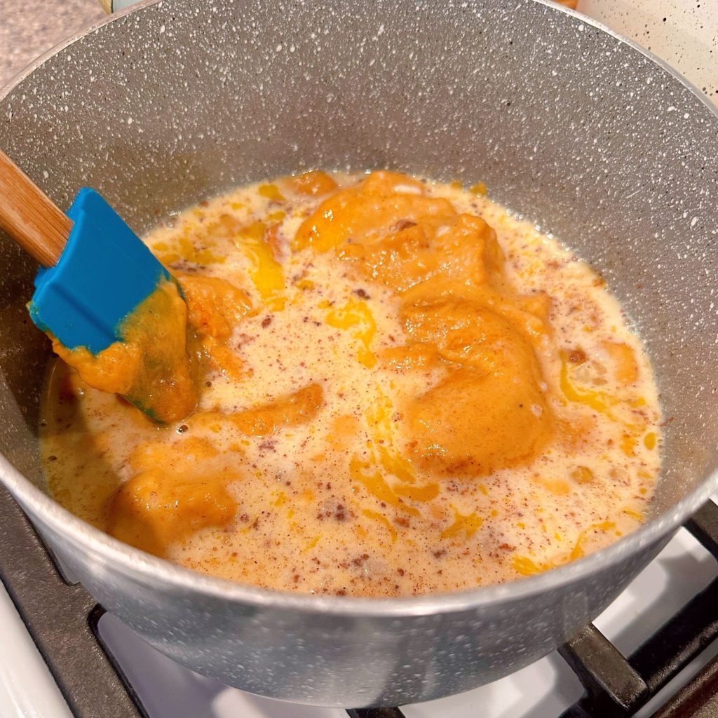 Pumpkin mixture ingredients in a large sauce pan over medium heat.