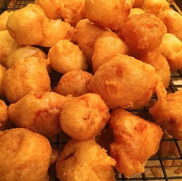 sweet-and-sour-chicken-after-frying on a cake rack for the oven