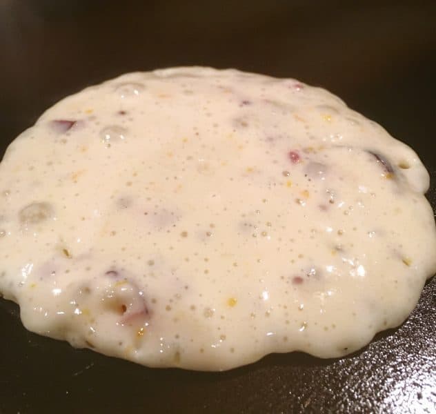 Cranberry Orange Pancake batter on the griddle