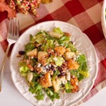 Chopped Autumn Harvest Salad on a salad plate with a fork.