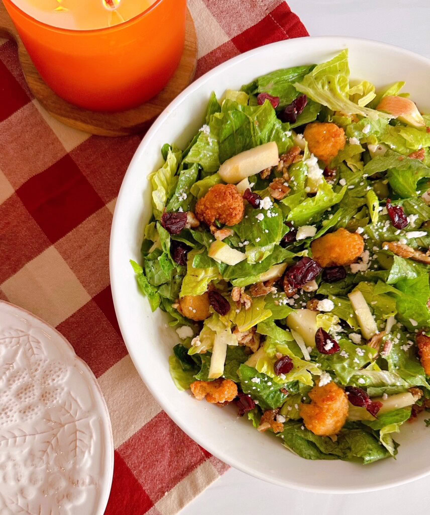 Chopped Harvest Salad in a large salad bowl on the table.