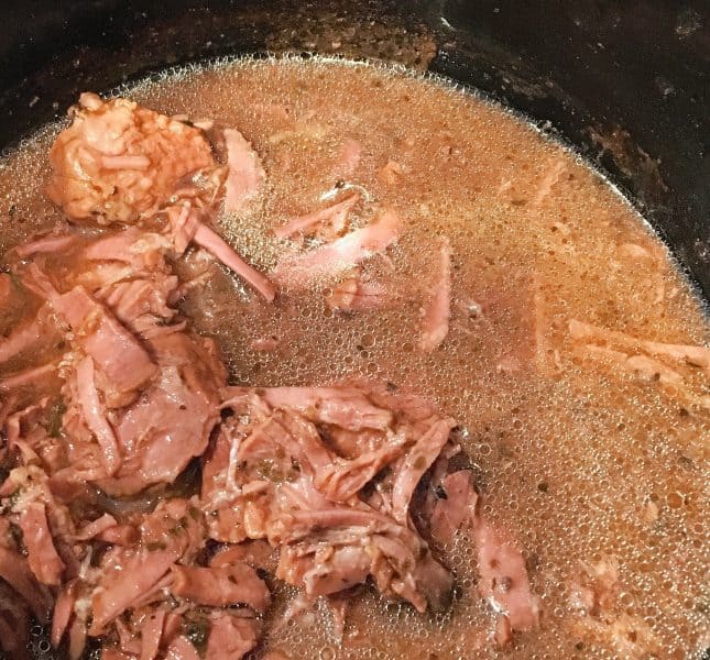 Italian Sub Sandwiches in the slow cooker cooked. 