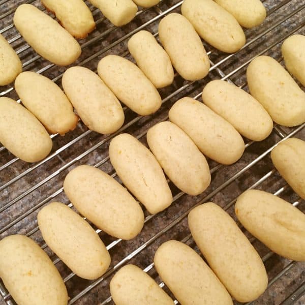 Baked orange logs on cooling racks