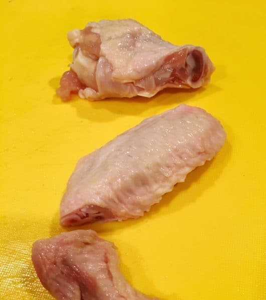 Chicken wing cut into three sections for wings