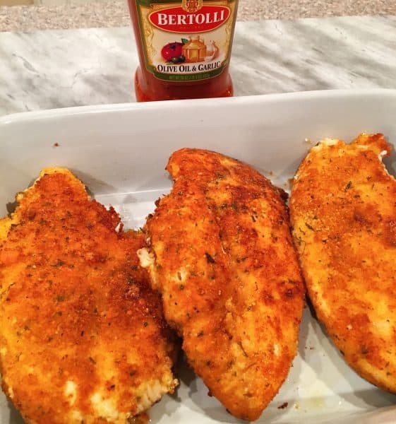 Fried Chicken breast in the casserole dish ready for marinara sauce