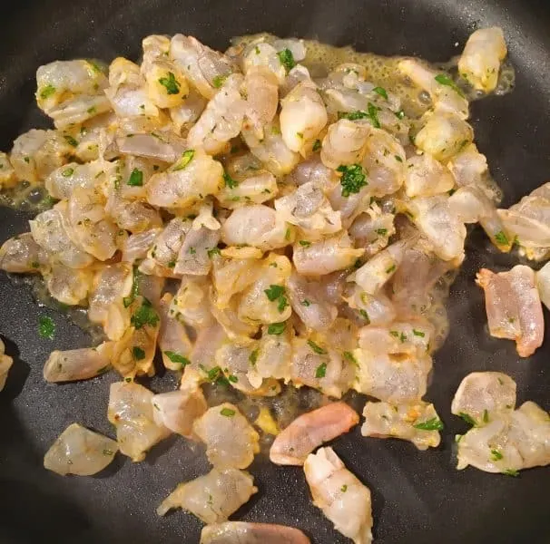 Cut up fresh shrimp for Shrimp Taco Salad