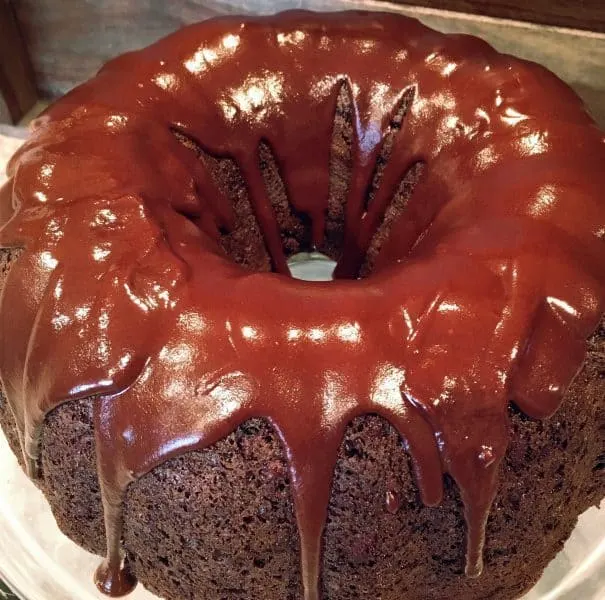 Too much chocolate cake drizzled with chocolate satin glaze