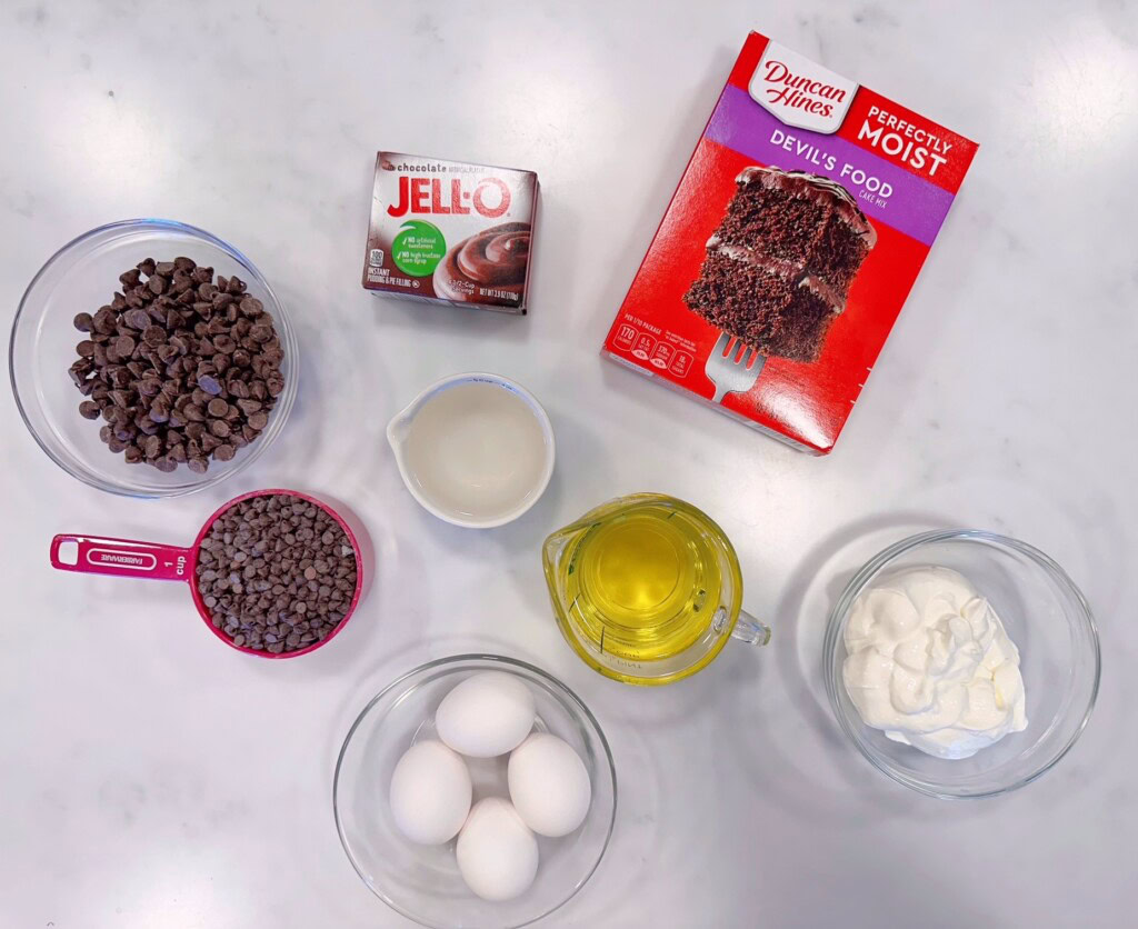 Ingredients for Too Much Chocolate Bundt cake on a white counter top.