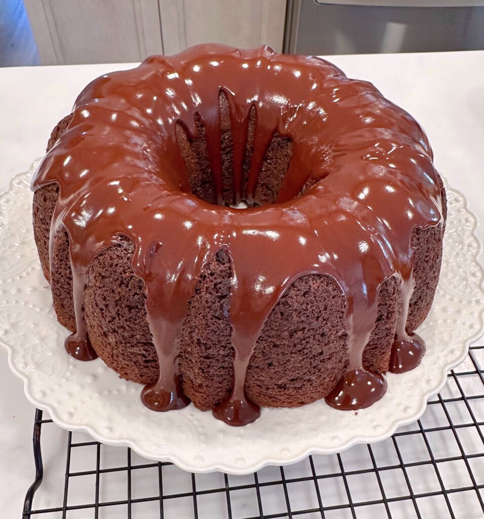 Chocoalte glaze over the entire chocolate bundt cake.