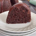 Sliced Chocolate Bundt cake with chocolate satin glaze.
