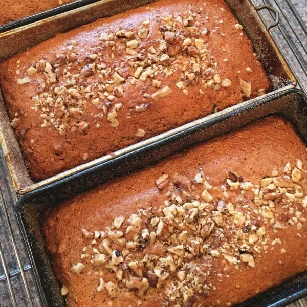 Baked Sour Cream Banana Nut Bread on cooling racks