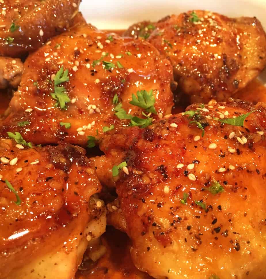 Chicken thighs seasoned in a honey glaze and sesome seeds