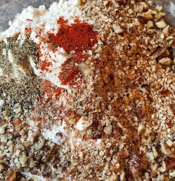 Pecan and Sesame Seed breading ingredients in a pan