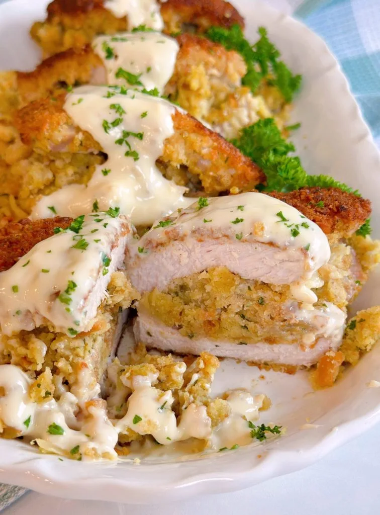 Inside the pork chops with the stuffing.