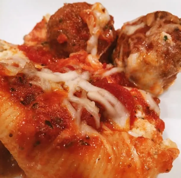 Meatballs and sauce with stuffed shells